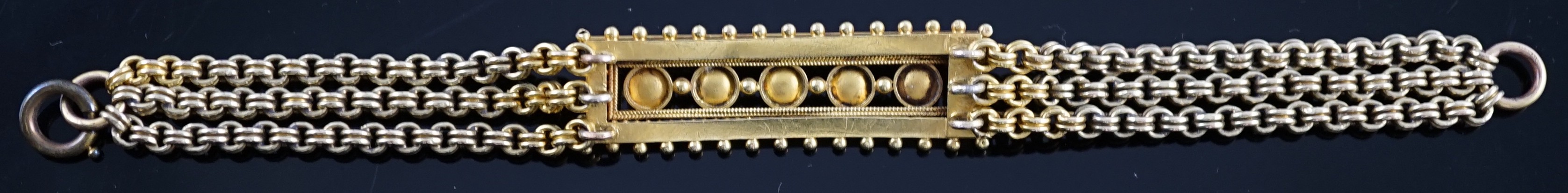 An early 20th century triple strand gold bracelet with central rectangular motif set with five cultured pearls